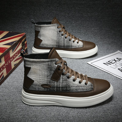 Pair of brown and gray high-top sneakers with a Union Jack box in the background.