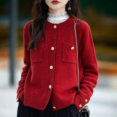 Woman in red button-front cardigan sweater