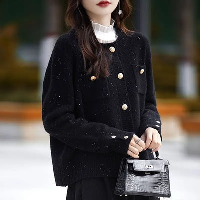oman wearing black knit cardigan sweater with button front and slim fit