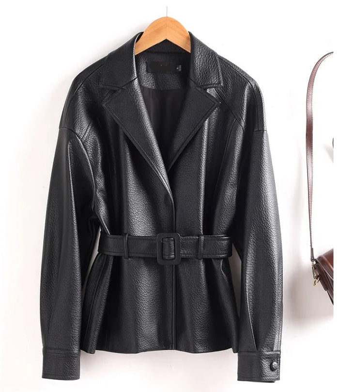 Black leather jacket with a belt on a white background