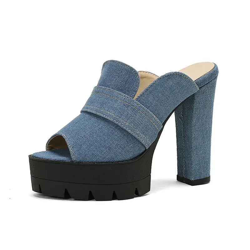 Denim platform sandal for women with a black sole on a white background