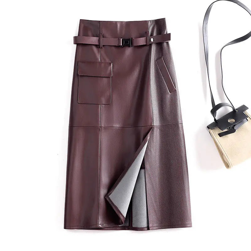Brown leather skirt with a belt on a white background