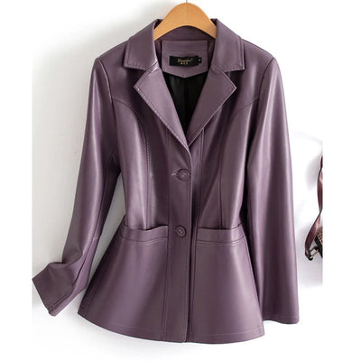 Purple leather jacket on a hanger against a white background