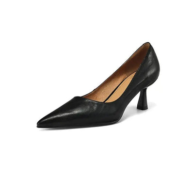 Black leather high heel shoe on a white background