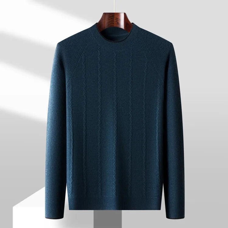 Blue sweater on a hanger against a white background