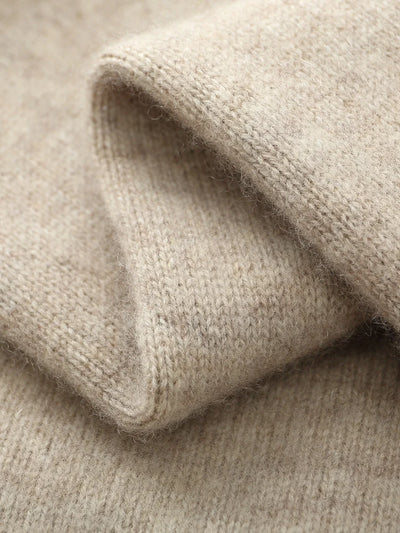 Close-up of beige fabric with a textured pattern