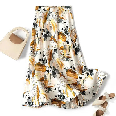 Floral patterned scarf with a beige handbag and sandals on a white background