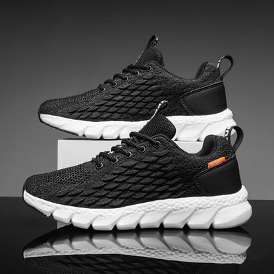 Black and white athletic shoes on a reflective surface with a dark background
