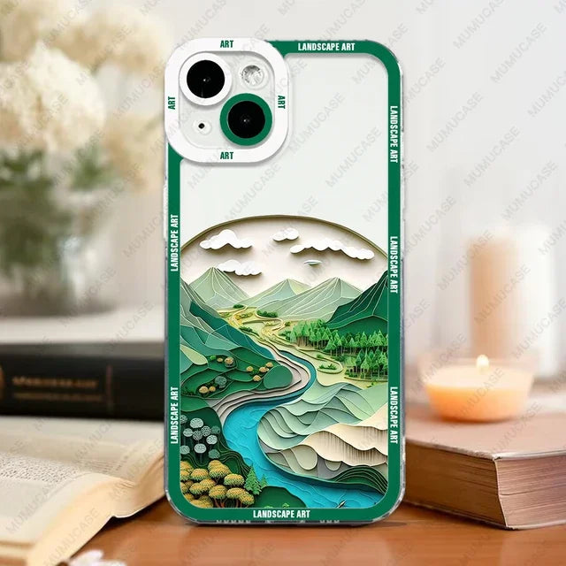 Phone case with landscape design on a surface with books and a candle in the background