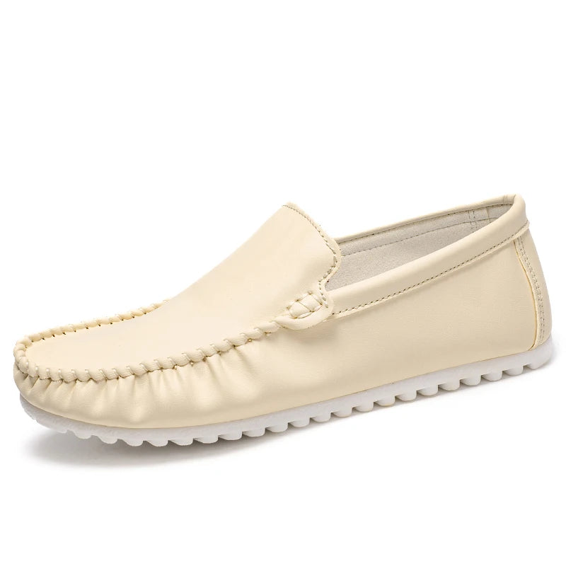 Beige loafer shoe on a white background