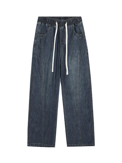 Blue denim pants with drawstring on a white background