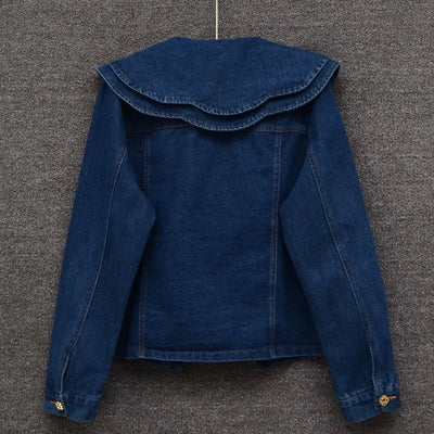 Back view of women’s casual denim jacket with relaxed fit and clean seams
