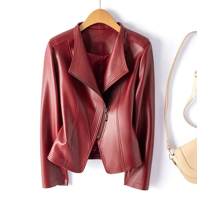 Red leather jacket on a hanger with a white background