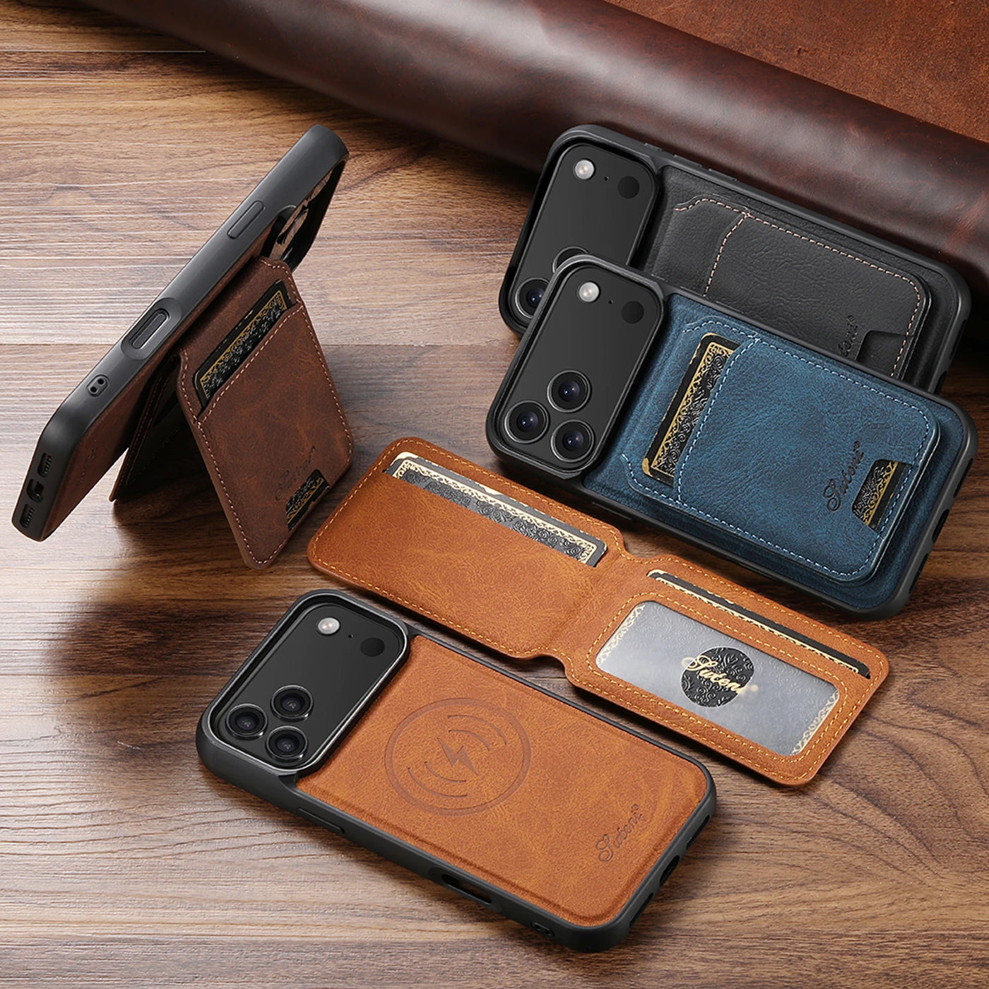 Collection of leather phone cases on a wooden surface