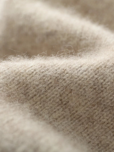 Close-up of beige fabric texture