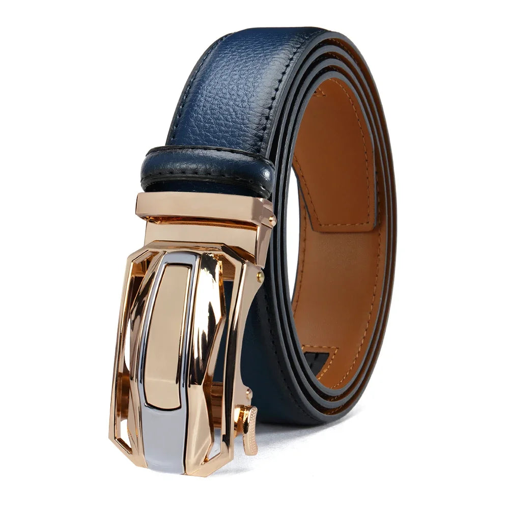 A rolled dark blue leather belt with a textured grain finish, a tan interior lining, and a large, polished automatic buckle in rose gold and silver tones, set against a plain white background.