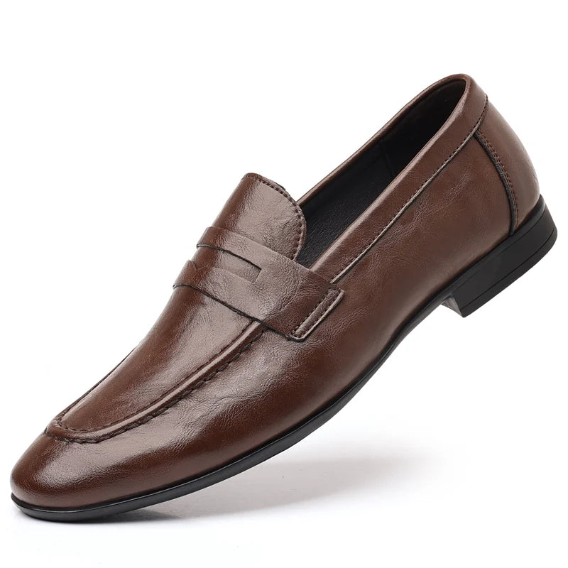 Brown leather loafer shoe on a white background