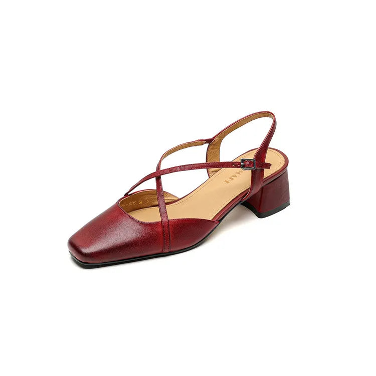 Red sandal with a square toe and thin strap on a white background