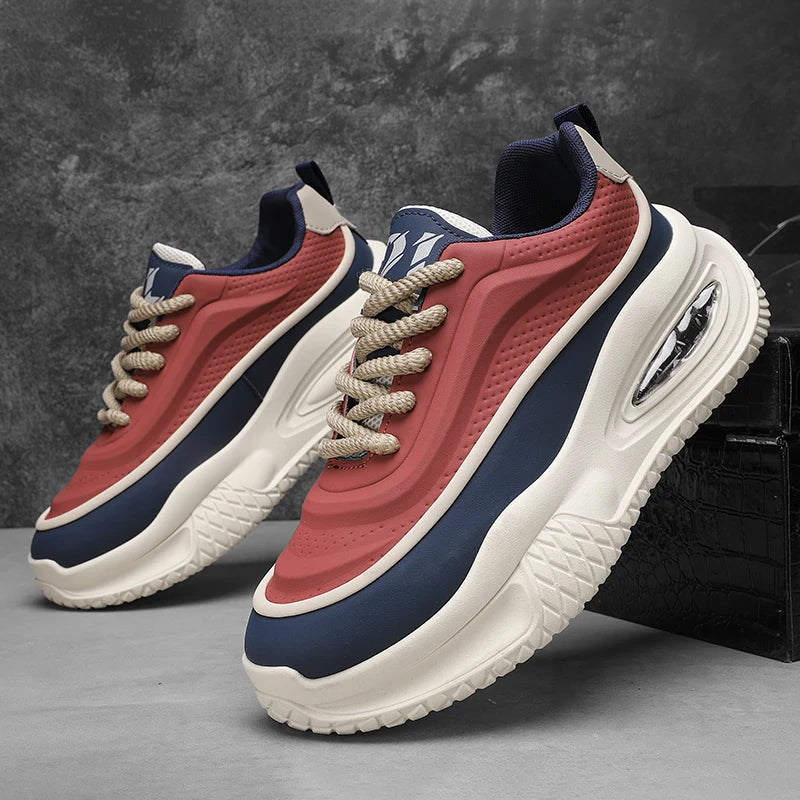 Red and blue sneakers with white soles on a dark background