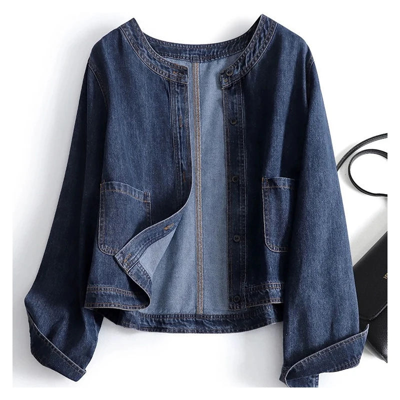 Blue denim jacket on a white background