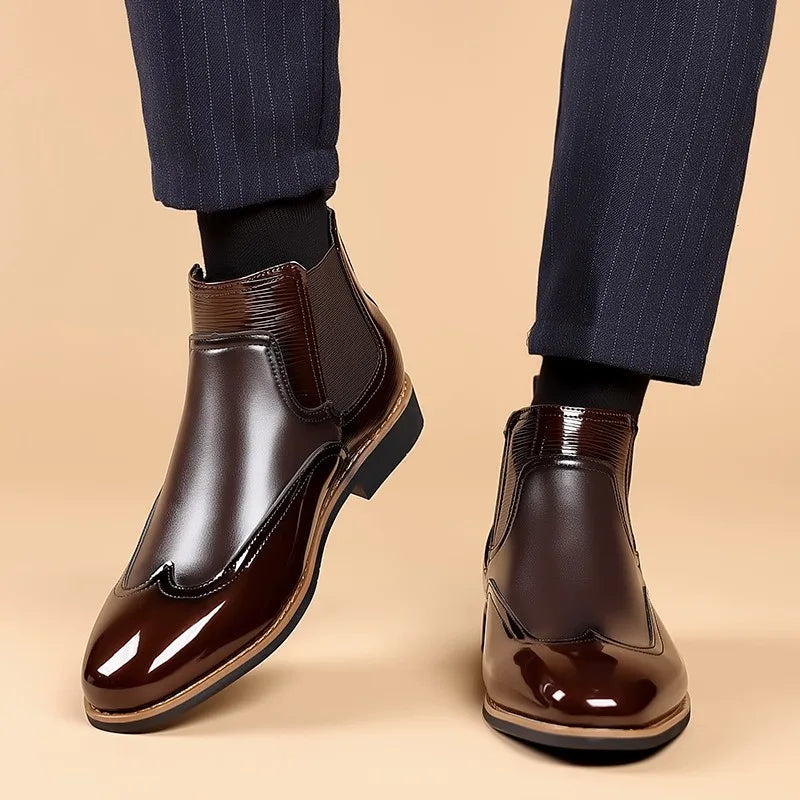 Brown leather shoes worn with navy pants on a beige background