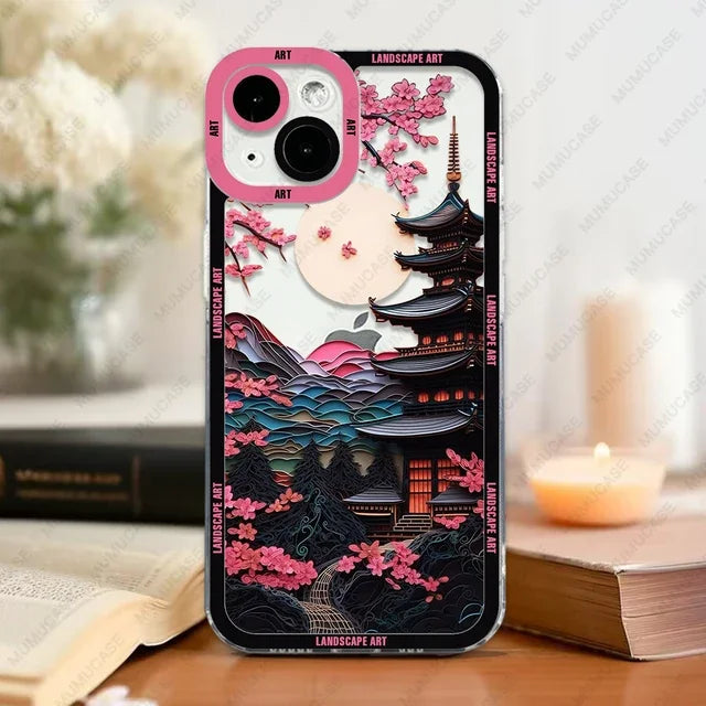 Phone case with Japanese landscape design featuring cherry blossoms and a pagoda on a wooden surface.