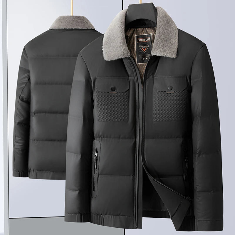 Black puffer jacket with gray fur collar on a light gray background