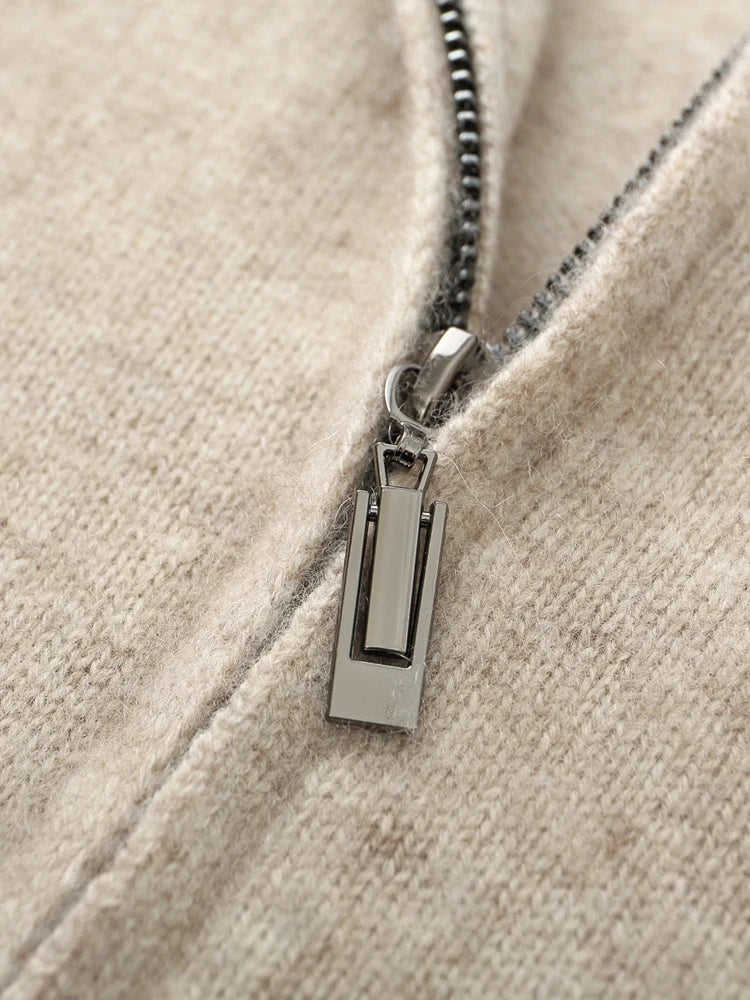 Close-up of a zipper on a beige fabric background