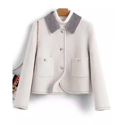 White jacket with gray collar on a white background
