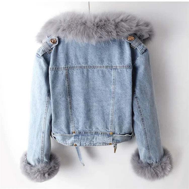 Denim jacket with fur trim on a white background