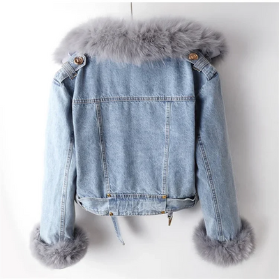 Denim jacket with fur trim on a white background