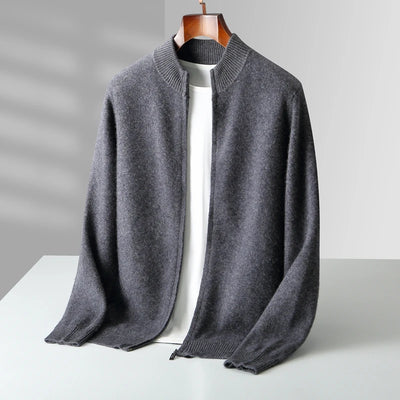 Gray sweater on a mannequin against a neutral background