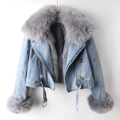Denim jacket with fur trim on a white background