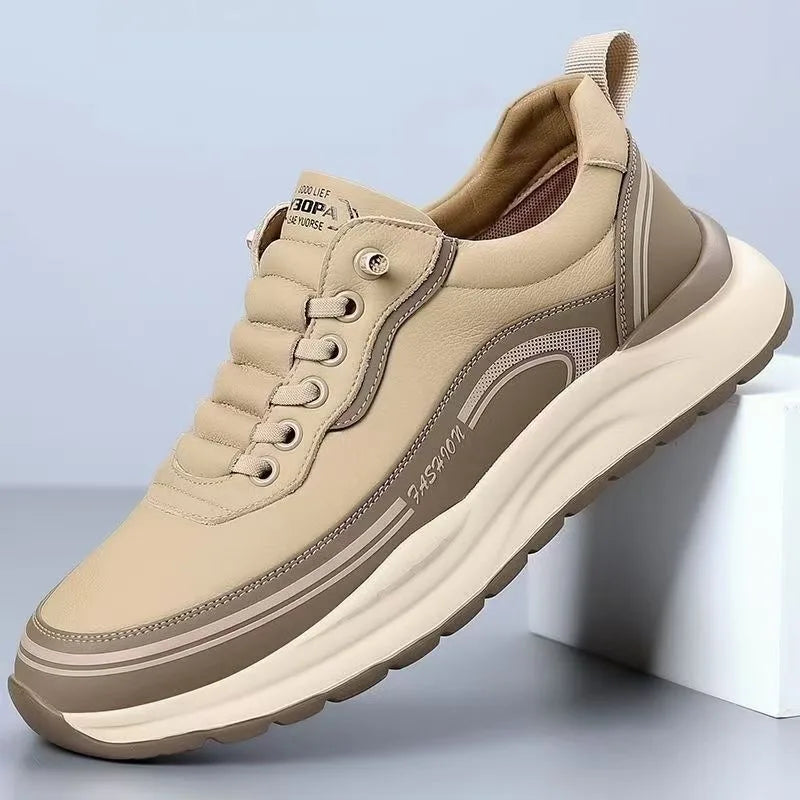 Beige sneaker with white sole on a light blue background