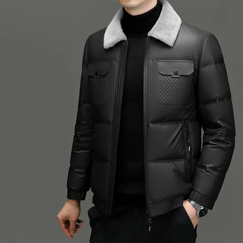Black puffer jacket with gray fur collar on a gray background