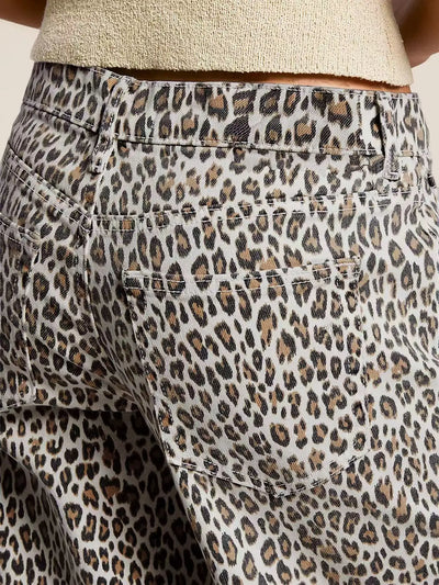 Leopard print pants with a beige top