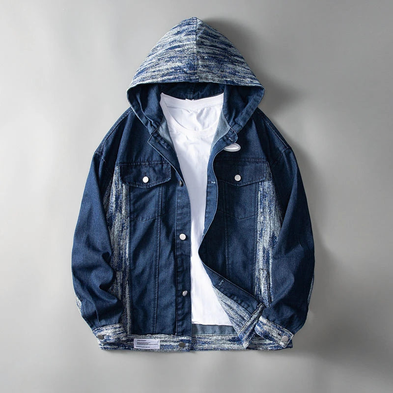 Blue denim jacket with a hood on a gray background