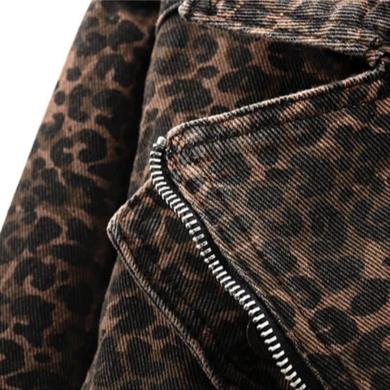 Close-up of turn-down collar on leopard print denim jacket.